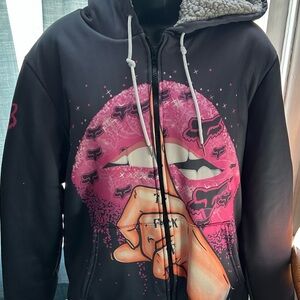 Faux fleece lined zip up sweatshirt Lips and “Shhh, quiet!”expression Med